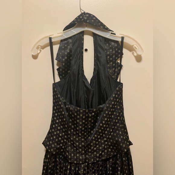 Black gown with gold and purple details. - Picture 6 of 8